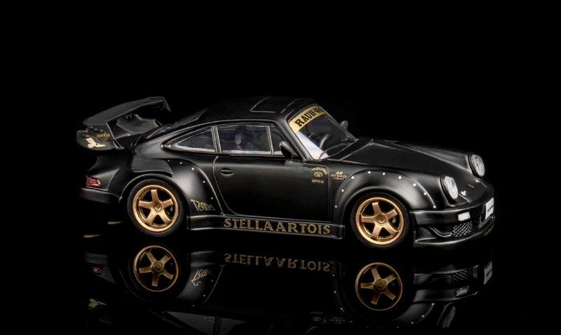 TPC 1:64 RWB 930 Stella Artois - Matt Black • DiecastSociety.com